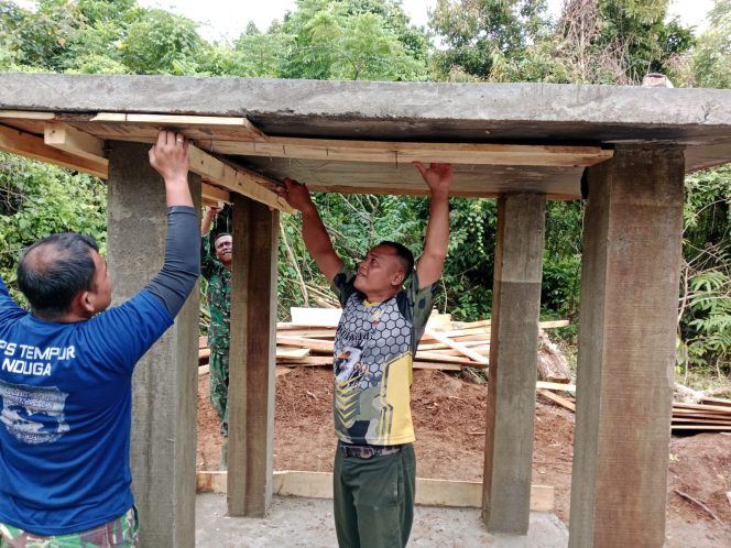 
 Satgas TMMD ke-123 Kodim 0416/Bute buka Papan Cor Lantai Tower MCK
