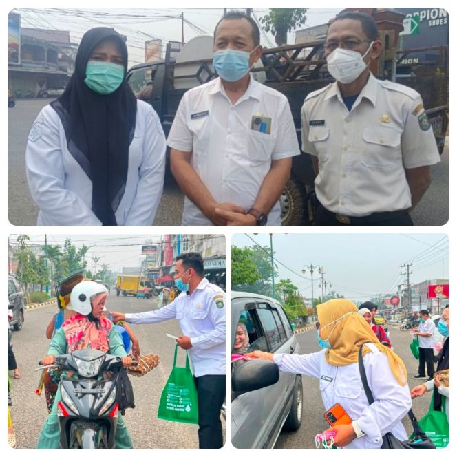 
 Dinas Kesehatan Bagi-bagi Masker, Kadinkes Bungo Imbau Warga Gunakan Masker saat Beraktivitas Diluar Rumah